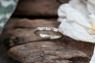 baguette diamond wedding band with antique beadwork detailing.